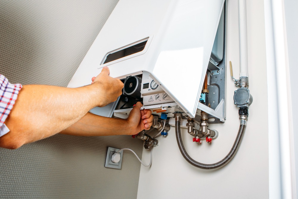 https://assets.site-static.com/blogphotos/2861/28742-plumber-attaches-trying-fix-problem-with-residential-heating-equipment-repair-gas-boiler.jpg