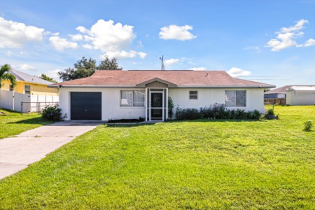 FEATURED LISTINGS - 1309 NE 4th Ave Cape Coral, FL 33909