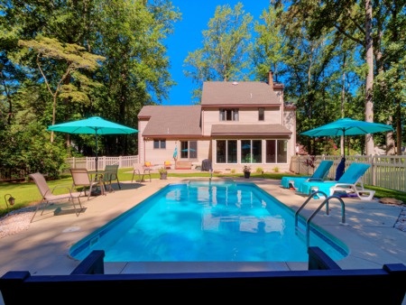In-Ground Swimming Pool Highlights the Backyard Oasis at This Featured Property in Millsboro, Delaware
