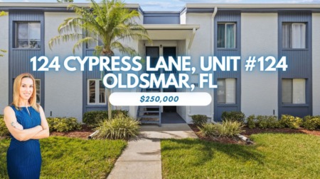 Discover Luxury Living at 124 Cypress Lane in East Lake Woodlands, Oldsmar Florida