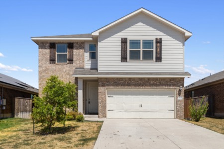 A home located in one of Manor's most prestigious neighborhoods