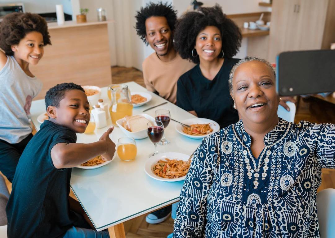 #4. Georgia Portrait of a multigenerational family taking a selfie together.