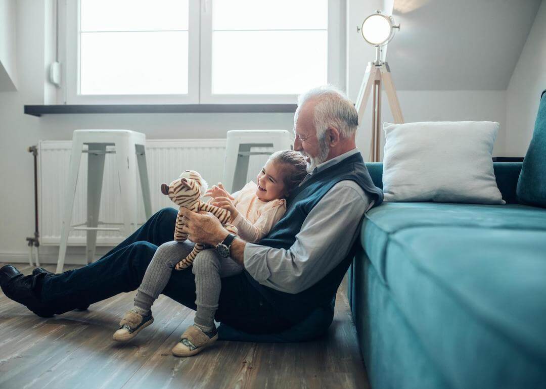 #10. Utah Elderly man holding his granddaughter.