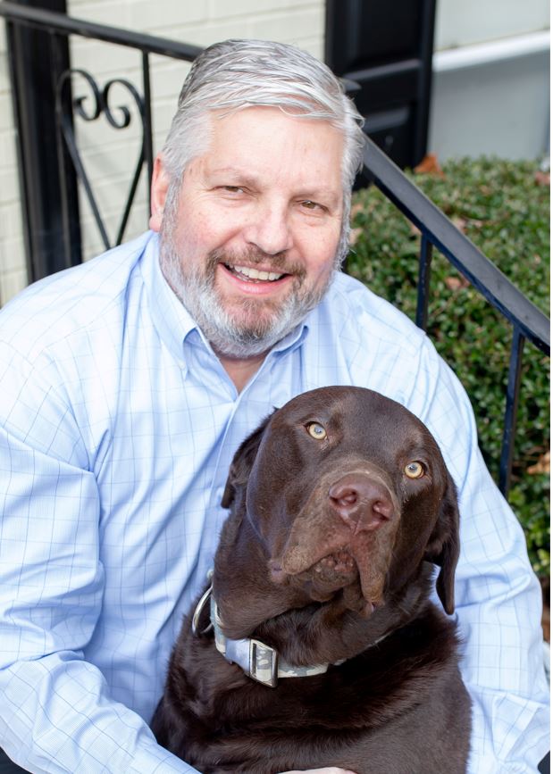 Picture of Greg Vitek and his dog
