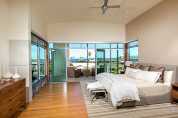 coastal primary bedroom beach house interiors