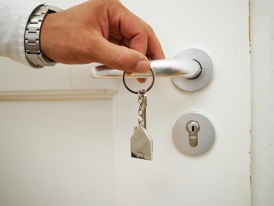 Homeowner holding home keys