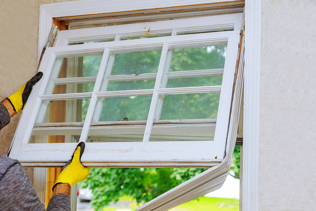 Taking out old windows with low energy efficiency