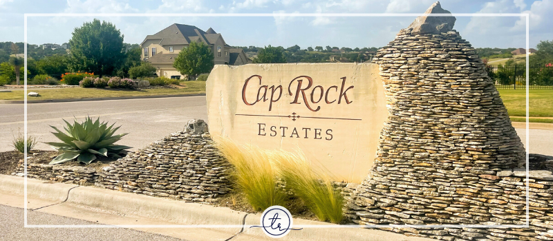 neighborhood rock monument reading Cap Rock Estates