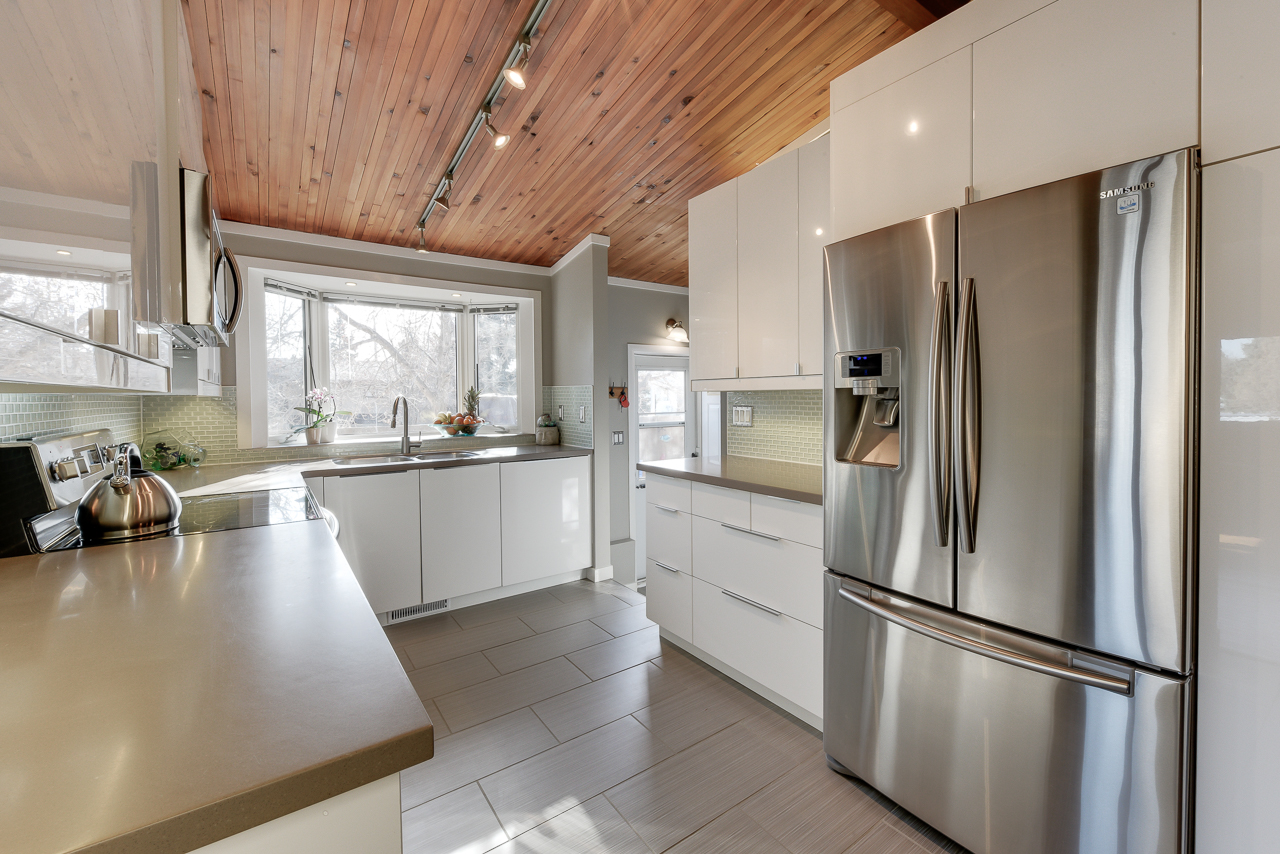 a kitchen with a sink and a window