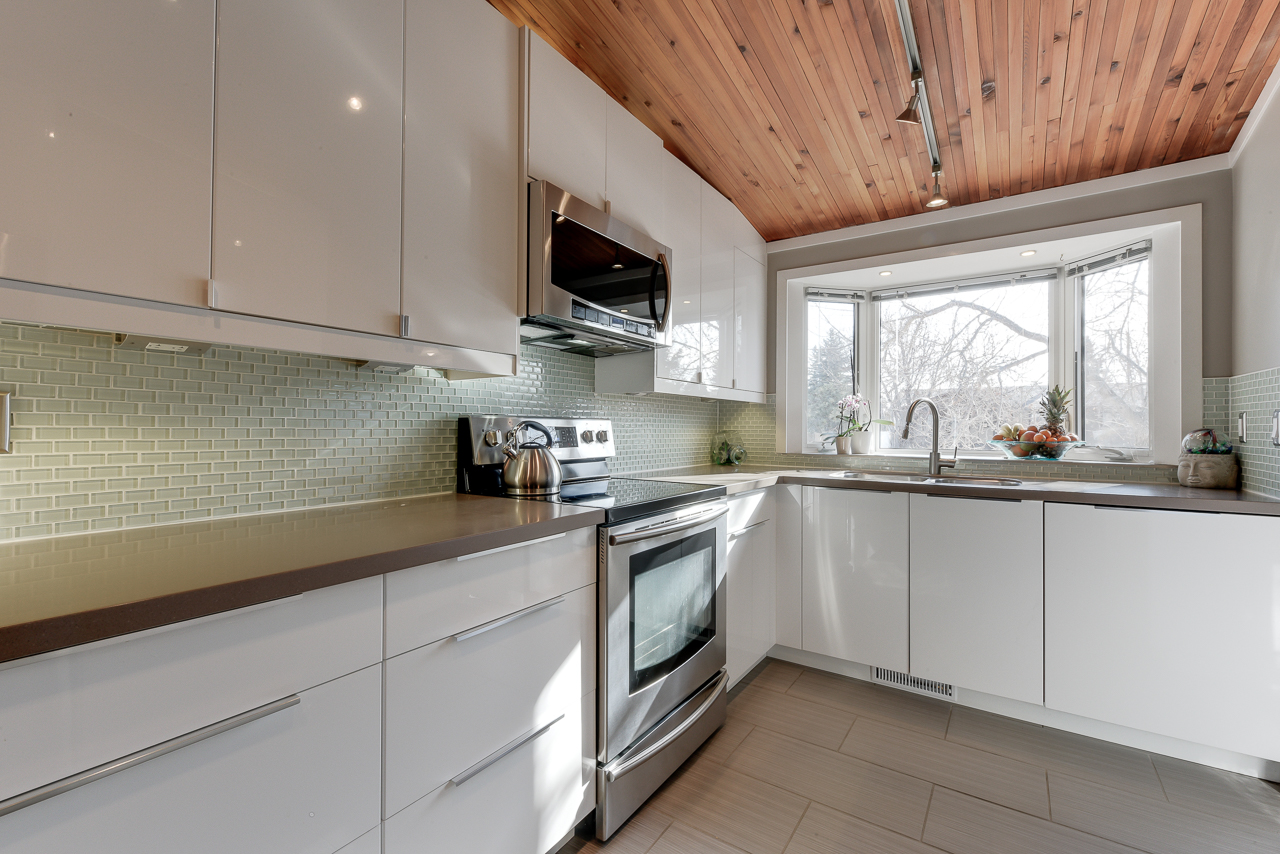 a kitchen with a stove top oven