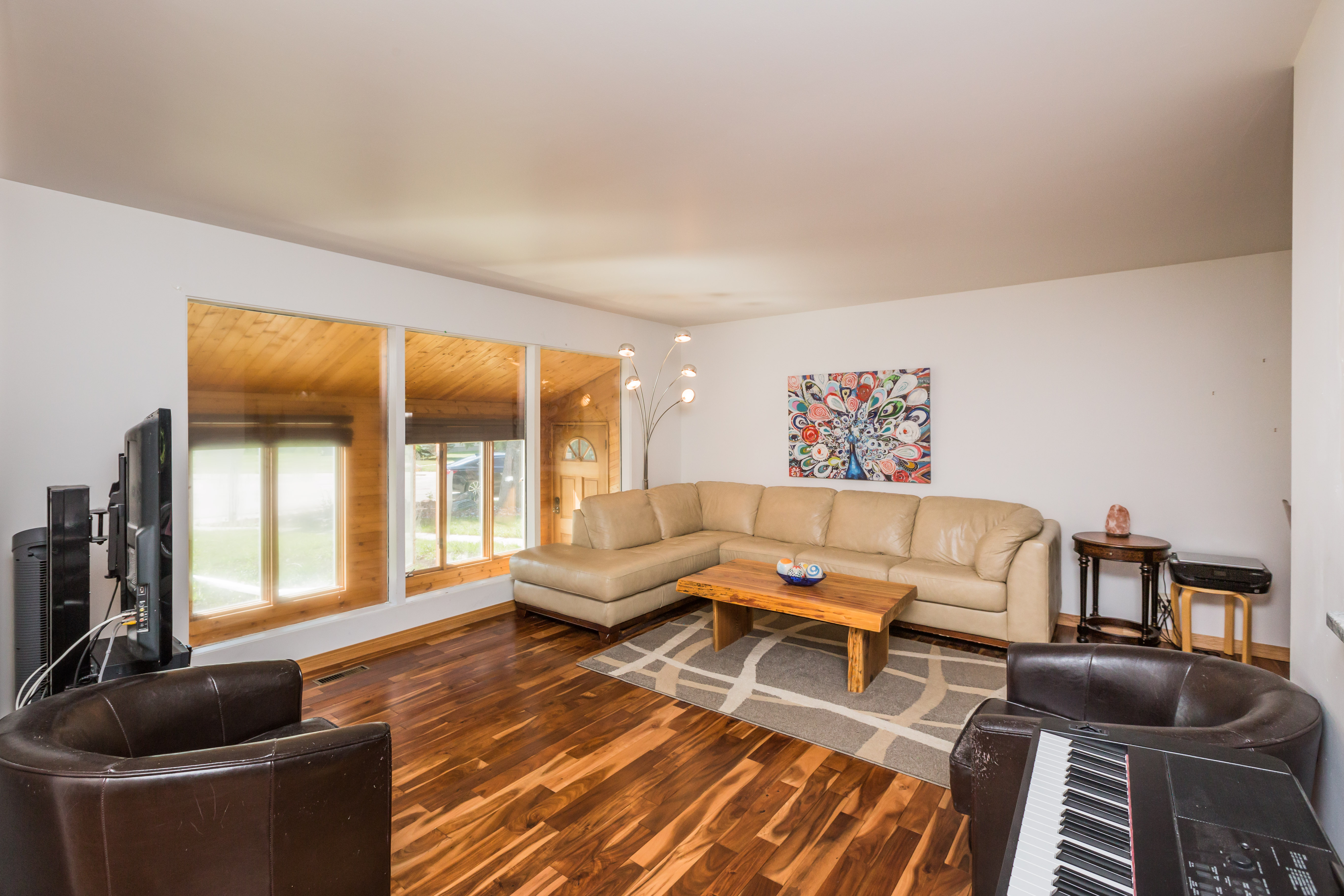 a living room filled with furniture and a fireplace