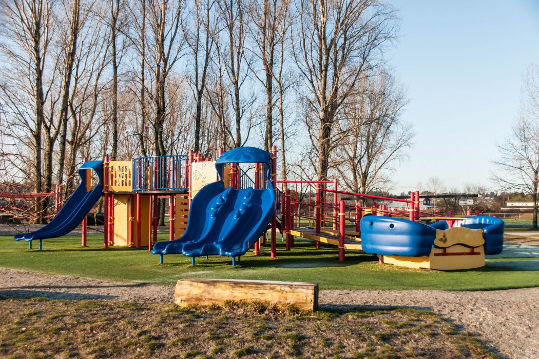image of a children's playground within a neighborhood