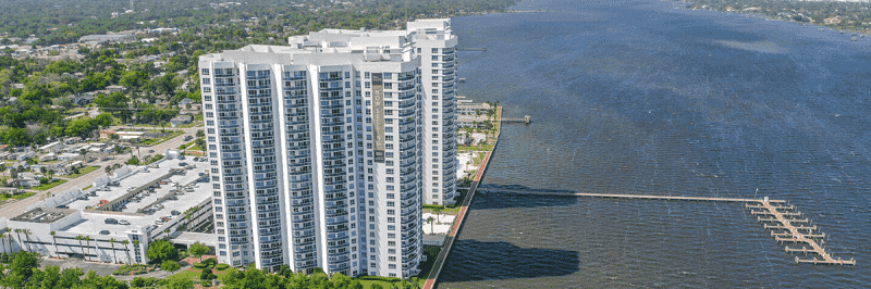 photo of a riverfront condo building