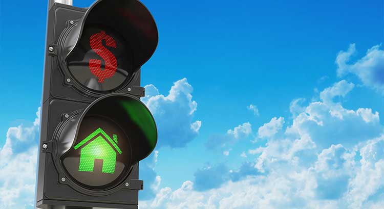 stop light with red dollar sign and green home blue sky white clouds
