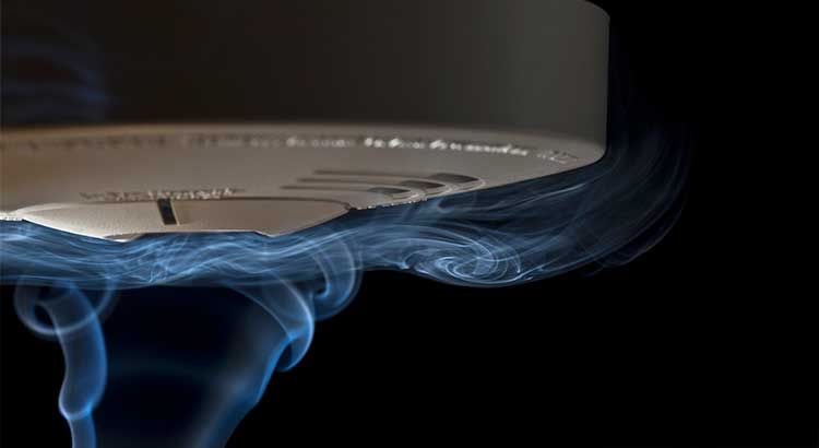 smoke detector with smoke plumes.