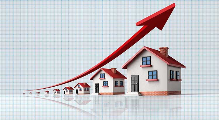 ascending in size homes lined up with an arrow pointing upwards 