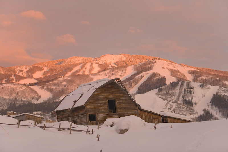 Snow covered Alpenglow barn in Steamboat Springs, Colorado