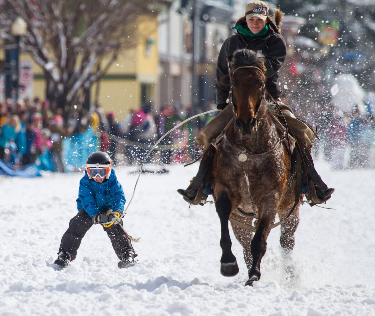 Woman and Child Racing at the Steamboat Springs Winter Festival