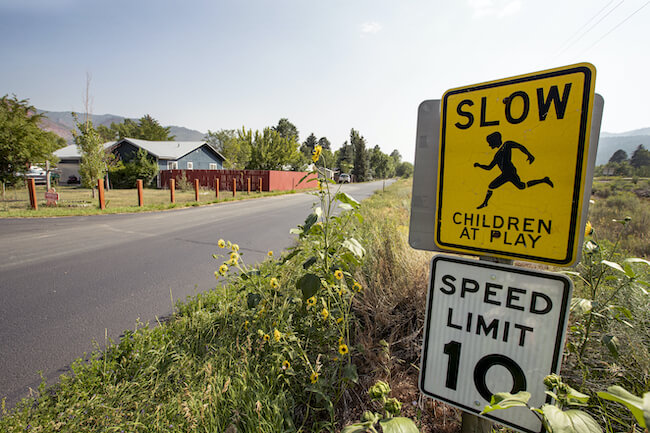 Goodman Neighborhood Children at Play and Speed Limit Signs in Durango Colorado