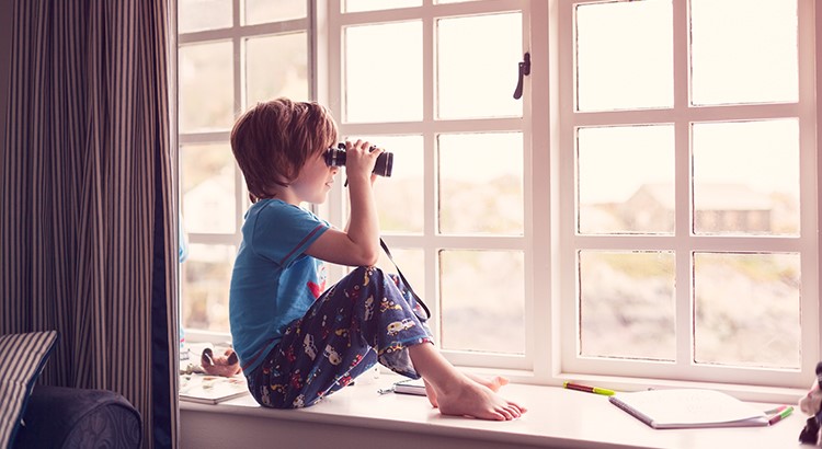 Boy using binoculars 
