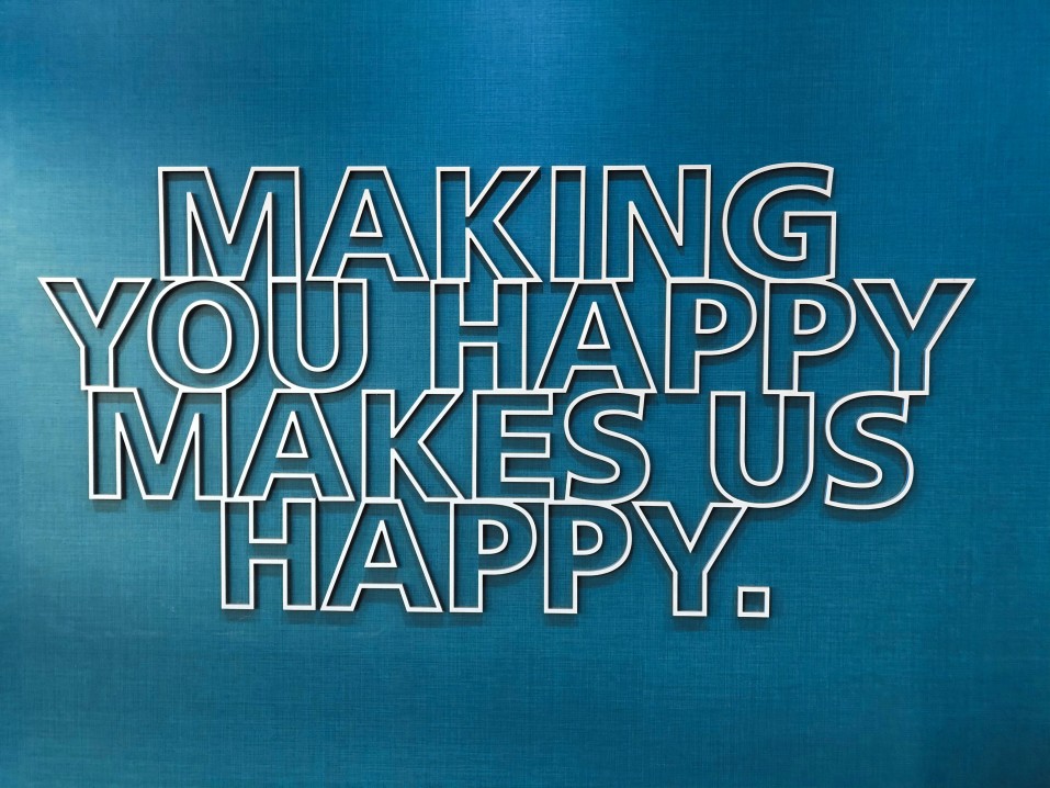 Making You Happy Makes Us Happy Text on Blue Background