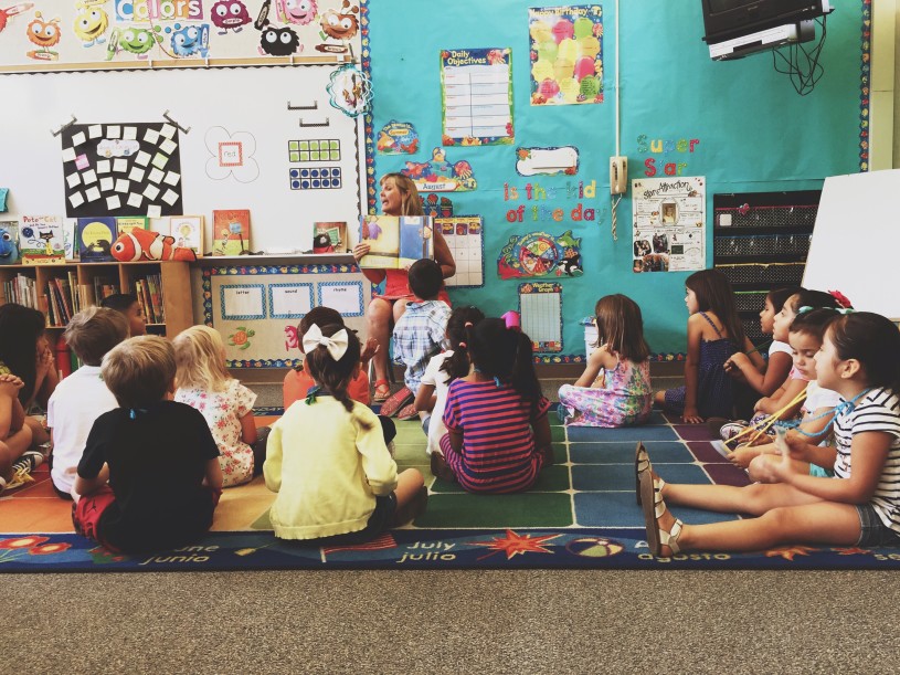teacher reading book to charleston, sc students