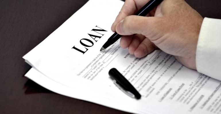 Charleston Physician signing Home Loan Documents