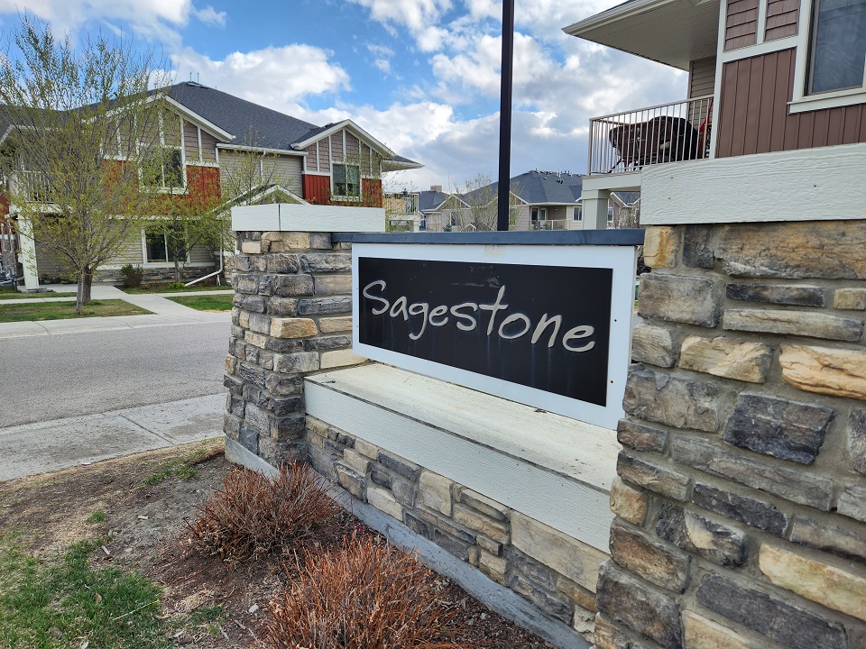 Sign at entrance to Sagestone in Sage Hill condo complex