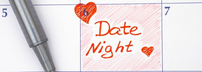 Calendar with the date circled saying date nigh with a red heart 