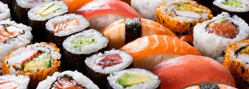 A bunch of mini sushi rolls 