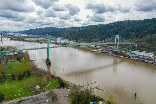 View of the Willamette River and St. John's Bridge in Cathedral Park, Portland, Oregon