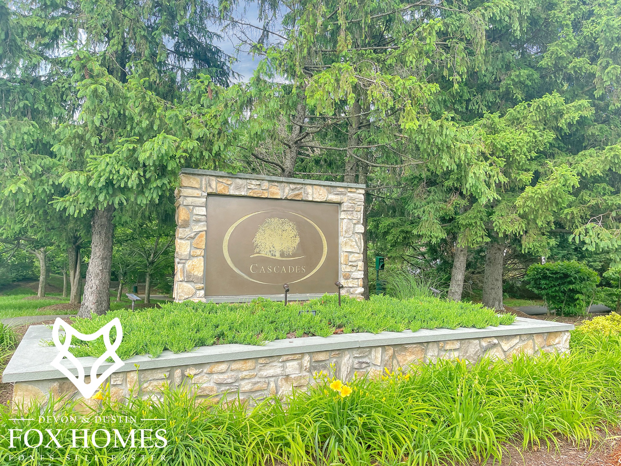 Homes-For-Sale-In-Cascades-Sterling-VA-District-Devon-and-Dustin-Fox-Fox-Homes-Team-Cascade-Signage