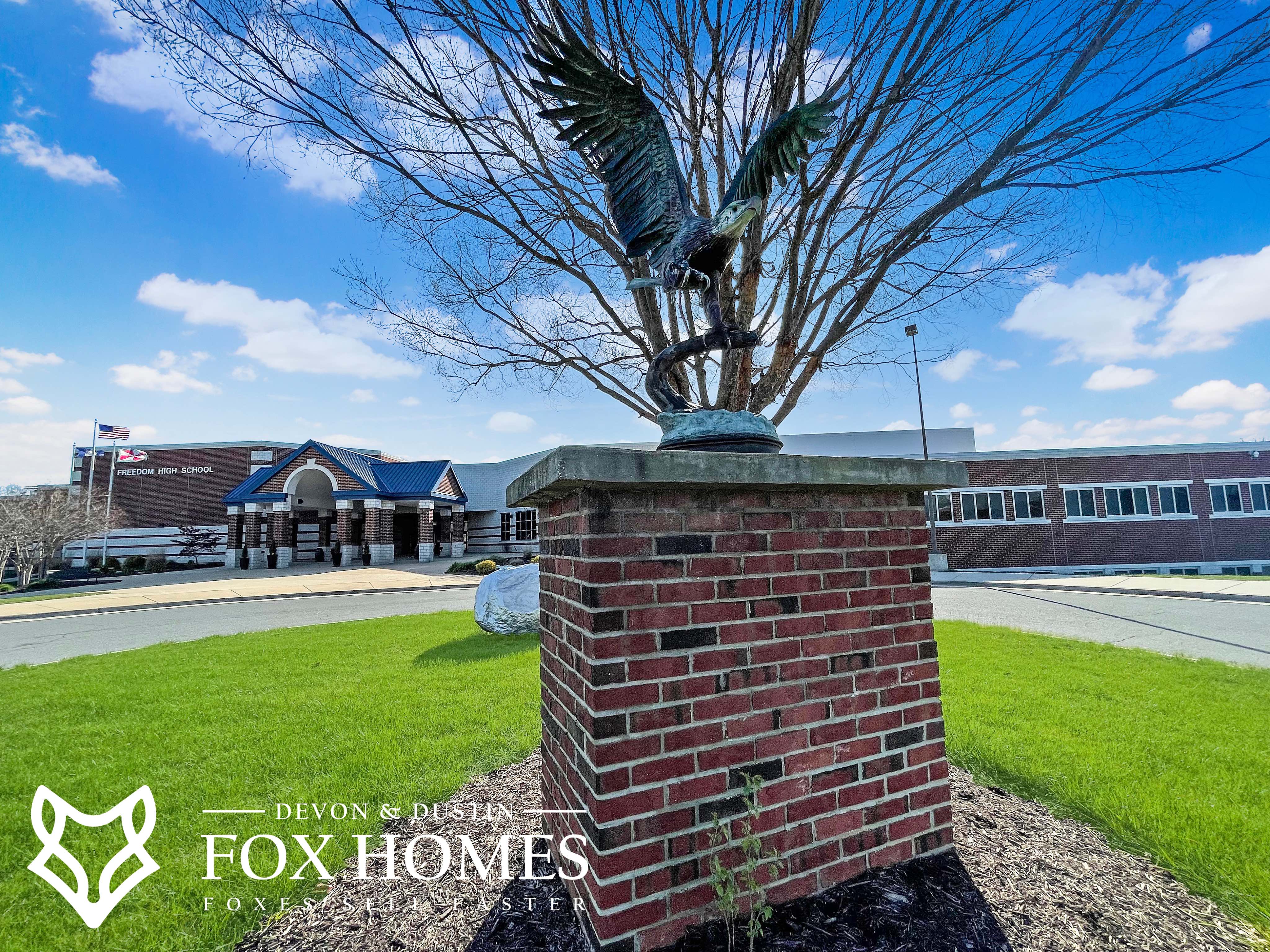 Homes-For-Sale-In-Freedom-High-School-District-Devon-and-Dustin-Fox-Fox-Homes-Team-Front-School.