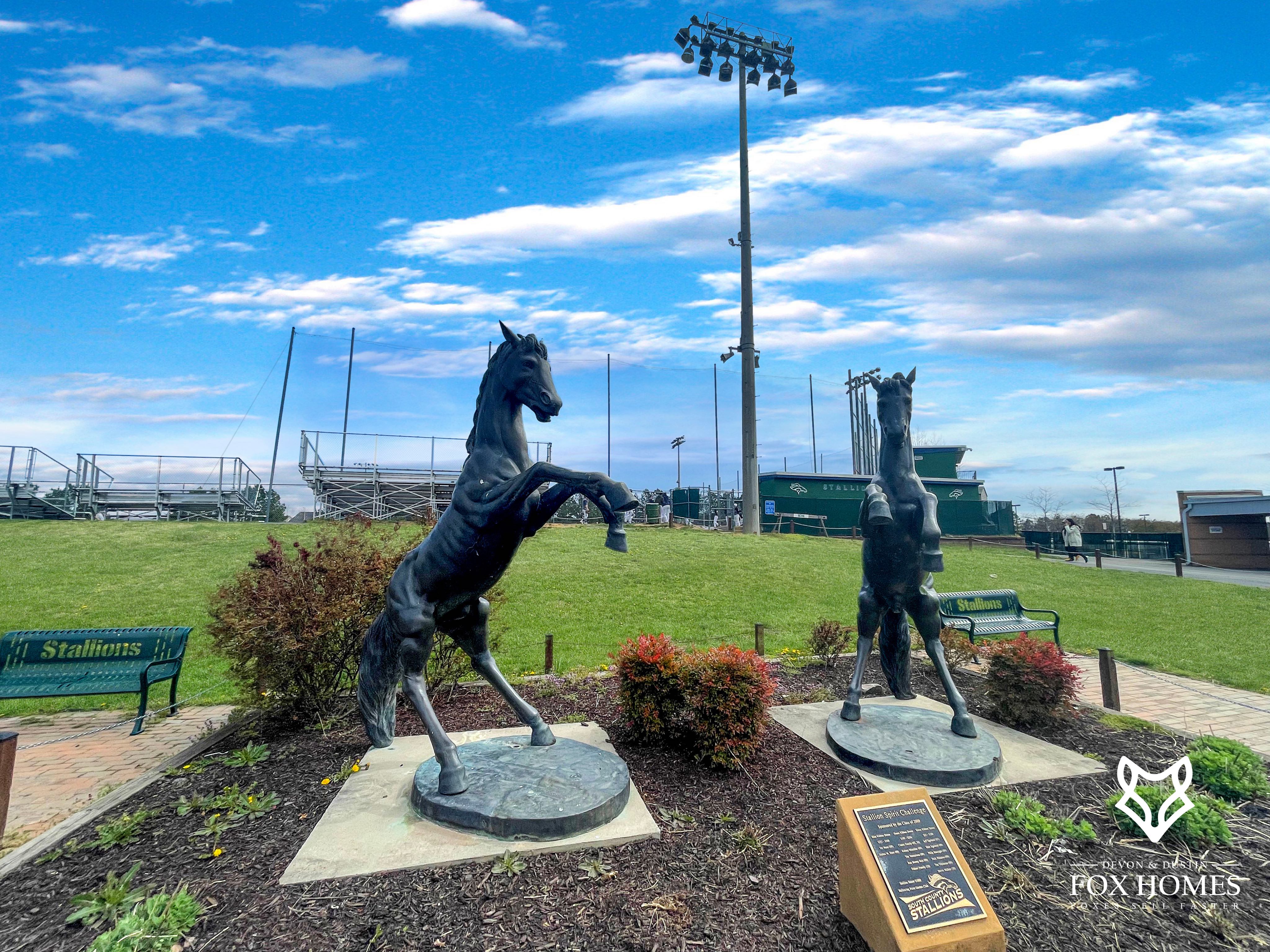 Homes-For-Sale-In-South-County-School-District-Devon-and-Dustin-Fox-Fox-Homes-Team-Horse-Statues