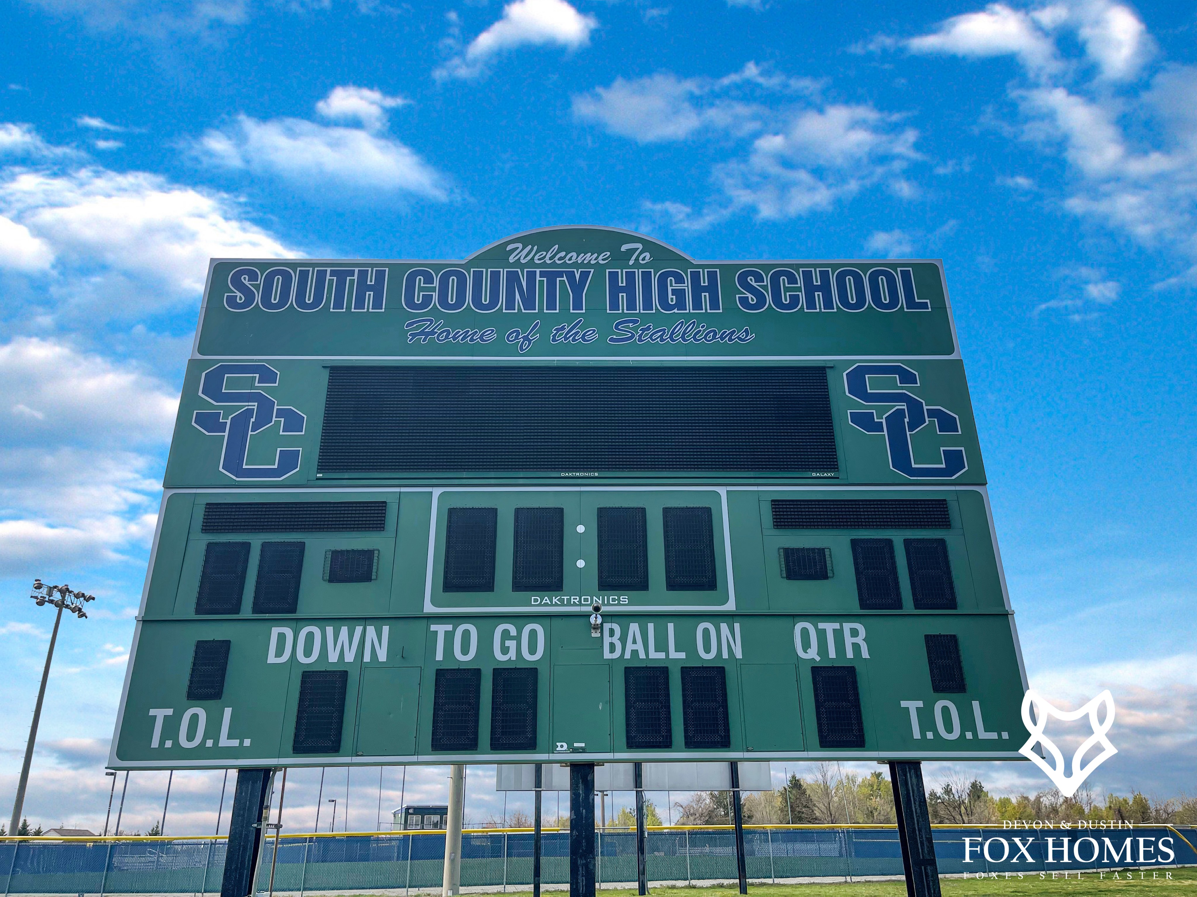 Homes-For-Sale-In-South-County-School-District-Devon-and-Dustin-Fox-Fox-Homes-Team-Scoreboard
