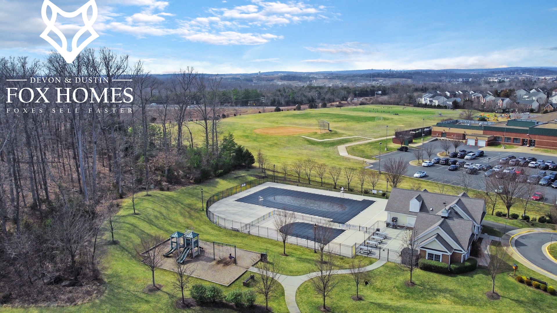 Lansdowne on the Potomac - Pool Aerial View 2 - Devon and Dustin Fox - Fox Homes Team Lansdowne on the Potomac - Pool Aerial View 2 - Devon and Dustin Fox - Fox Homes Team