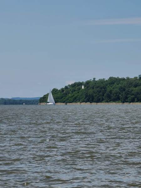Waterfront Chesapeake Bay Homes for Sale - Sailboat in front of Turkey Point Lighthouse