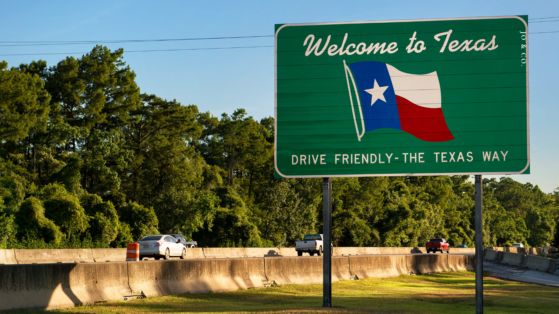 welcome to texas sign next to highway