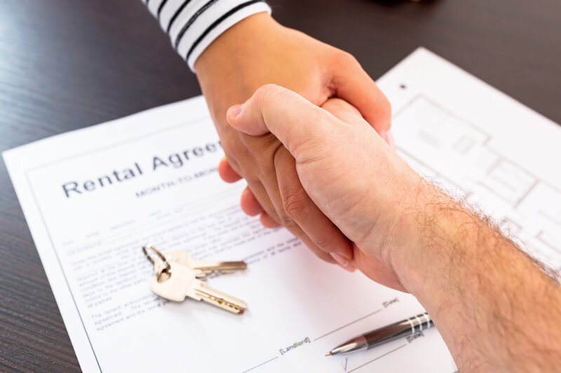 Handshake over Rental Agreement