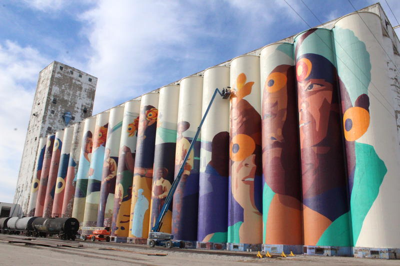 Colorful mural on the side of a grain elevator