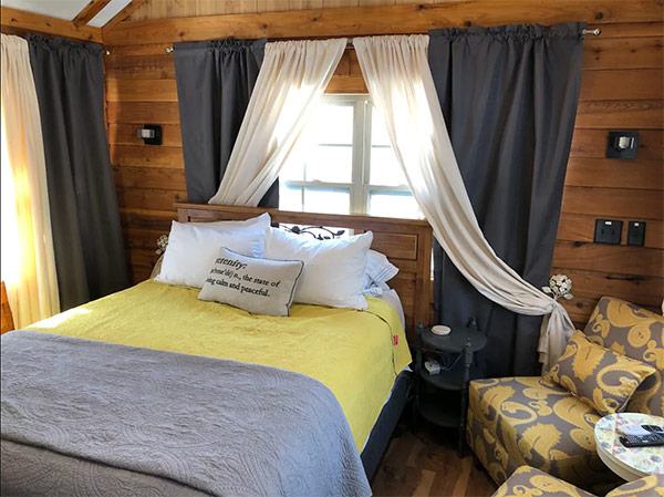 Interior bedroom in the Serenity Creek Treehouse