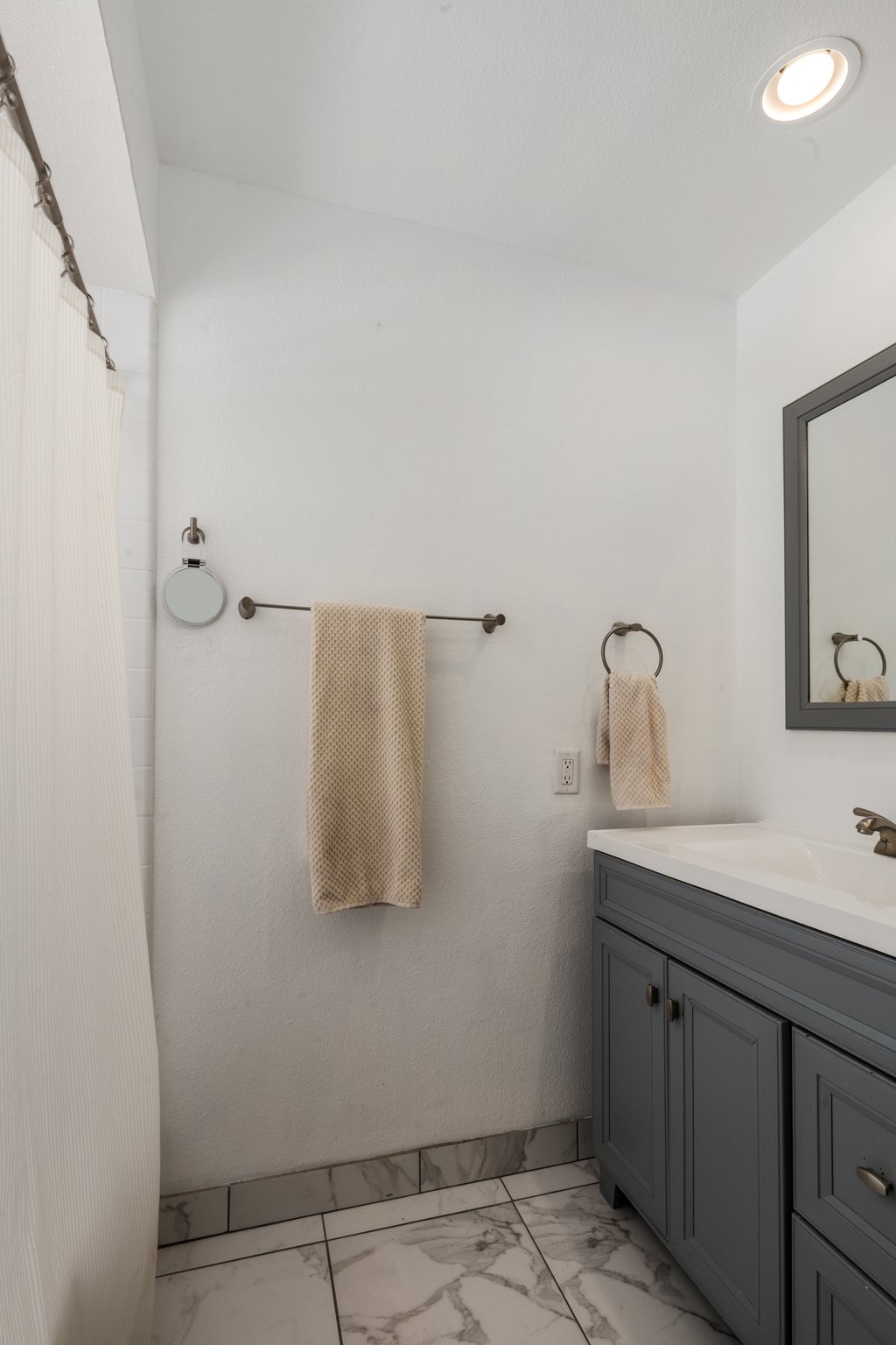 Remodeled bathroom in this Pointe Tapatio 2 bedroom home with mountain views