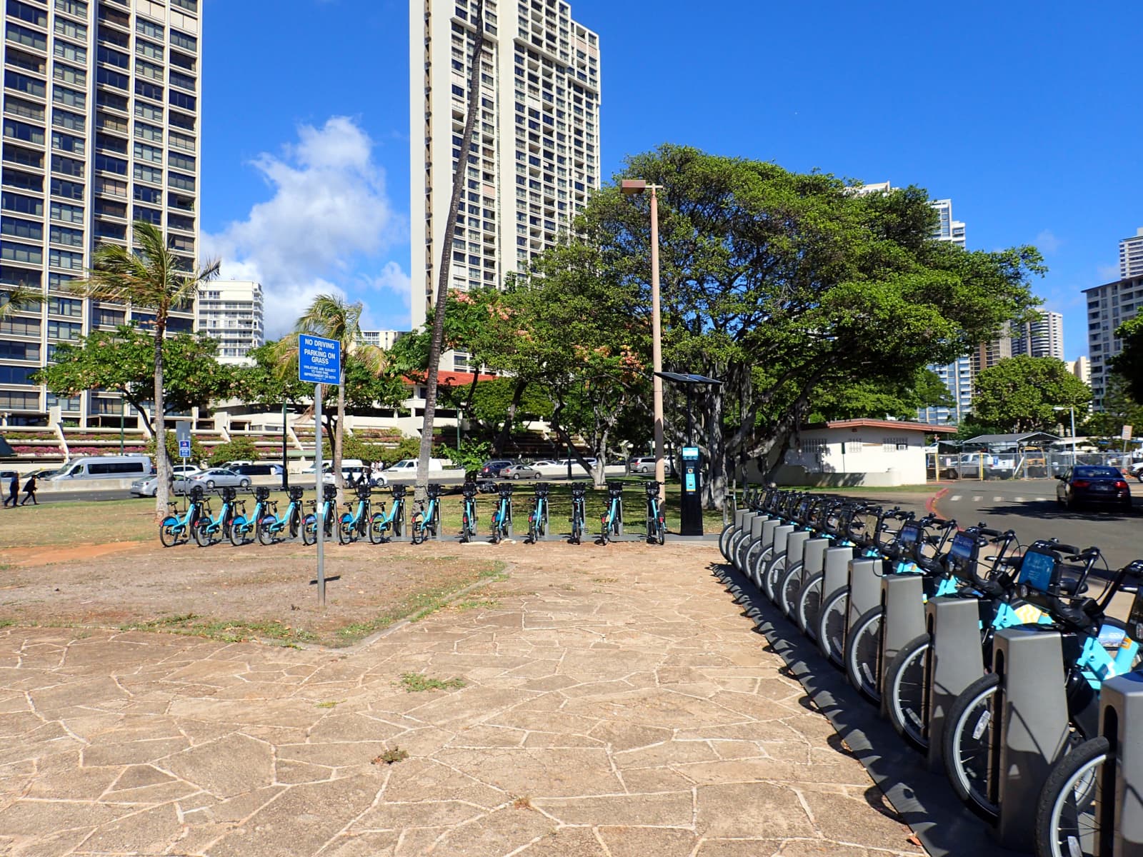 Biki Bike Station with large building in background