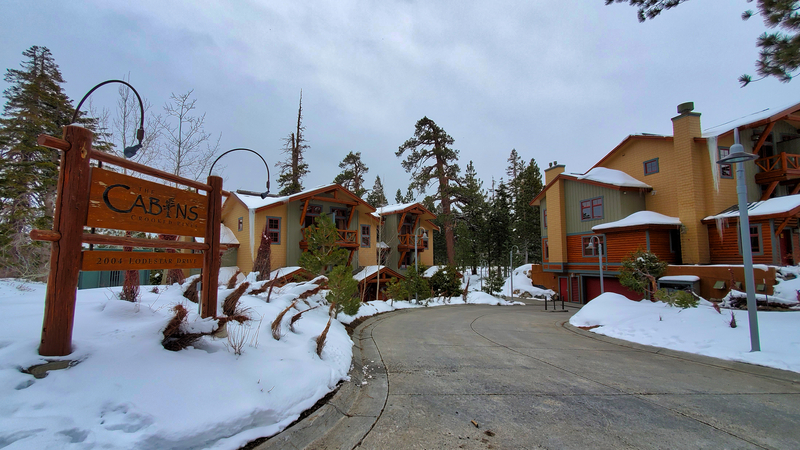 Snowy Exterior Photo of the Entrance to The Cabins at Crooked Pines Condos in Mammoth