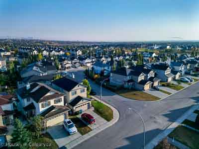 Overhead view of the community of Evergreen. two homes in the forefront and several rows of homes behind them.
