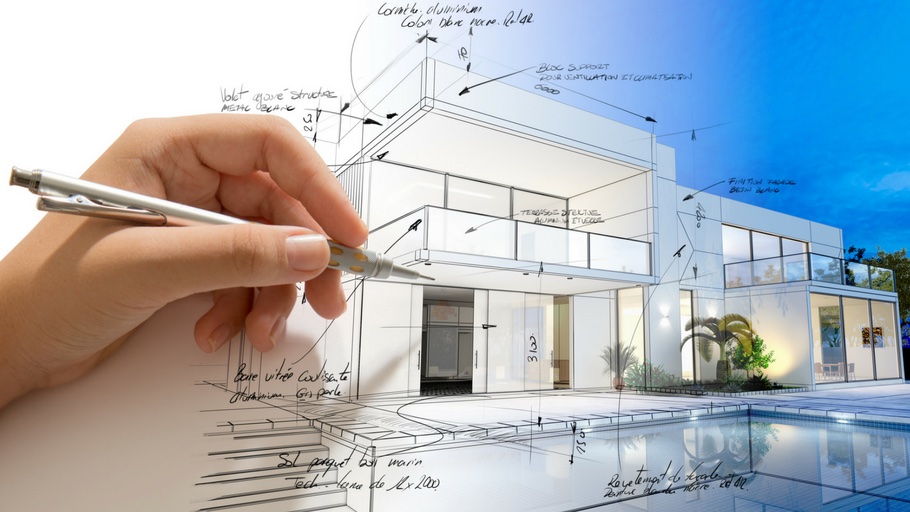 A picture of a architect's hand drawing a home that's coming to fruition.