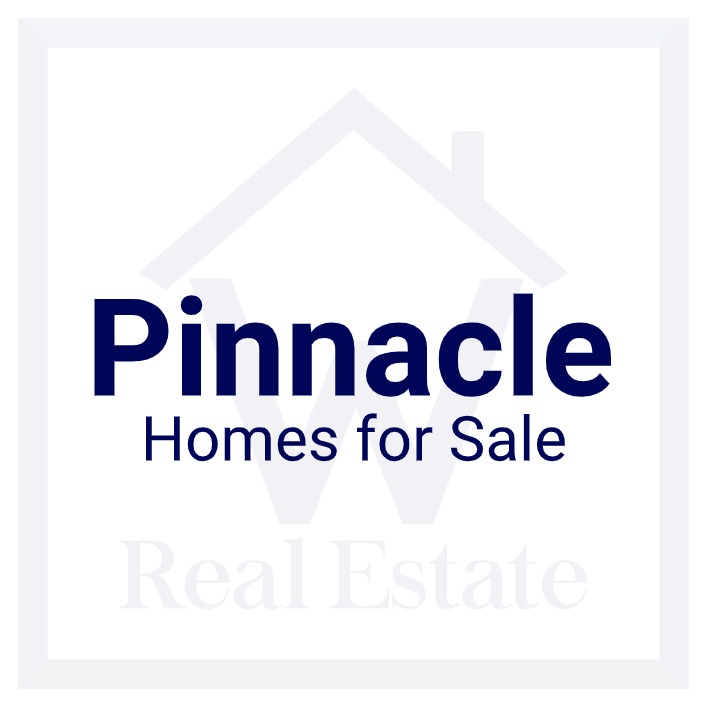 A custom pic showing the words "Pinnacle Homes for Sale" over W Real Estate's logo.