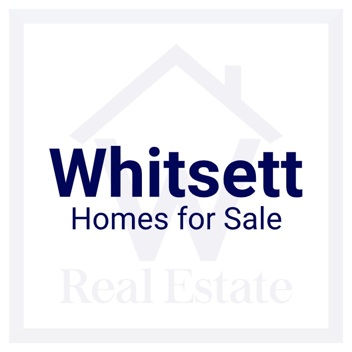 A custom pic showing the words "Whitsett Homes for Sale" over W Real Estate's logo.