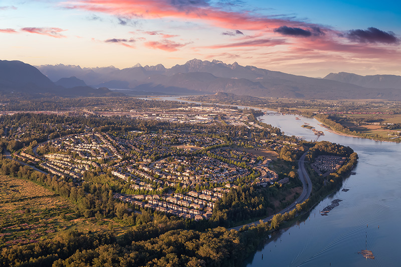 https://assets.site-static.com/userFiles/2959/image/Blog/Dis._Mainland/The_Pros__Cons_of_Moving_to_a_City_Like_Port_Coquitlam.jpg