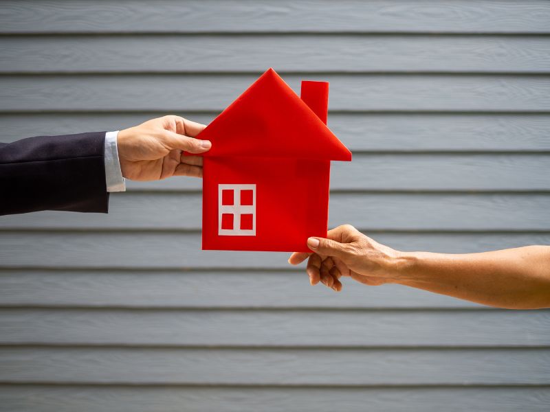 Can a real estate deals agent buy their own listing
